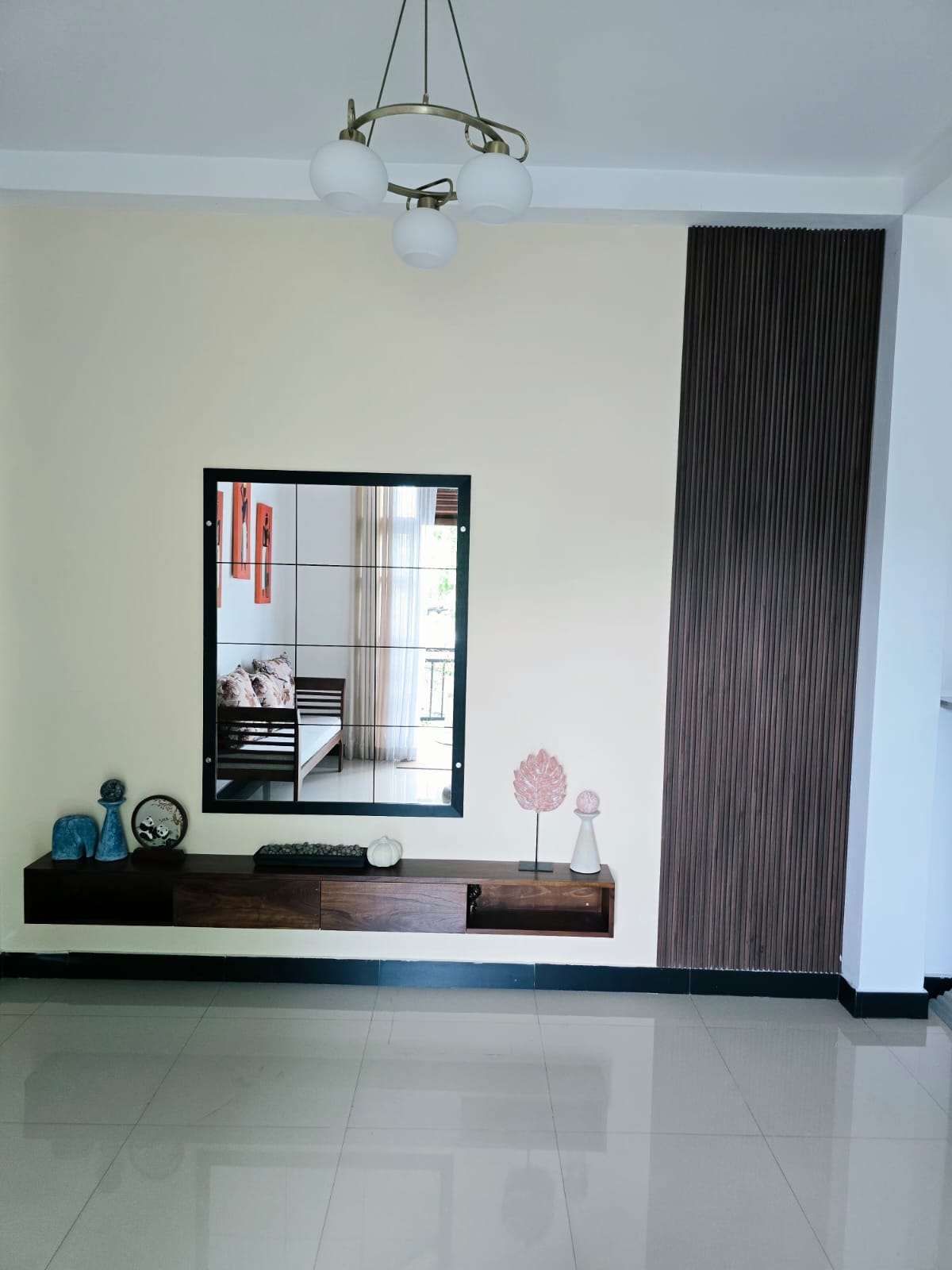 Interior Design Colombo, Navinna, Maharagama, Sri Lanka Residential interior design project, completed interior, second floor living area tv lobby mirror and wall panel